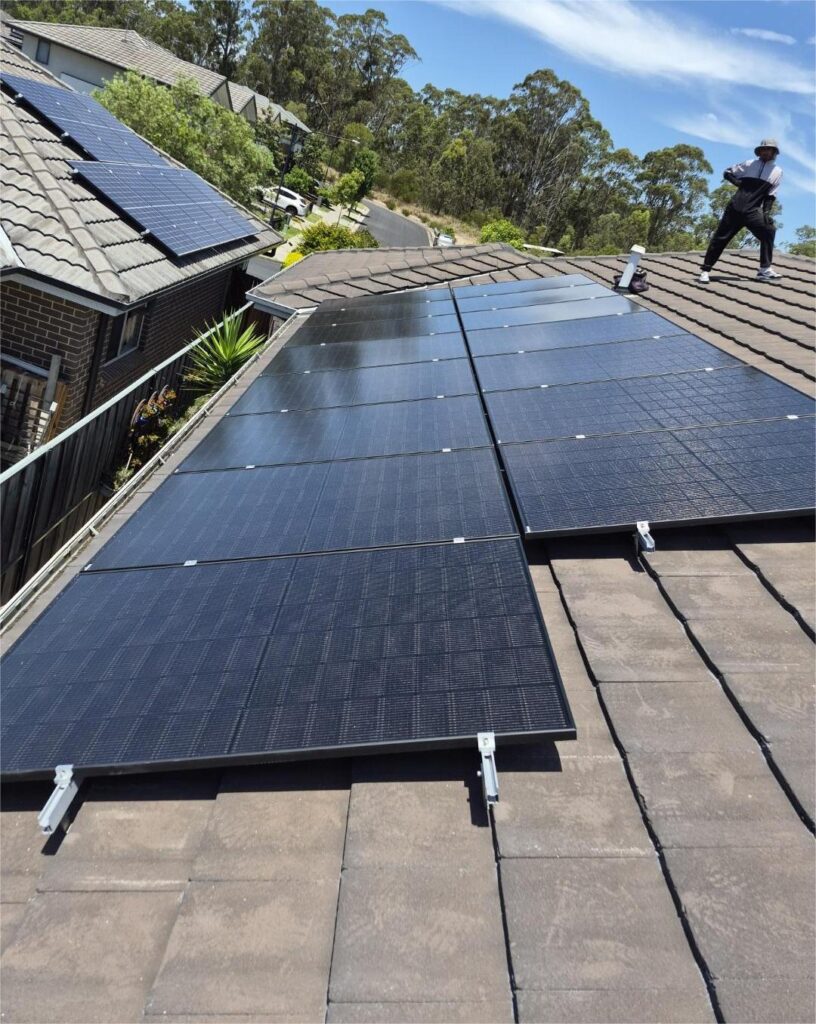 Solar panels on the roof, Installer Man working